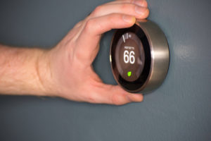 Electric thermostat to save money and energy