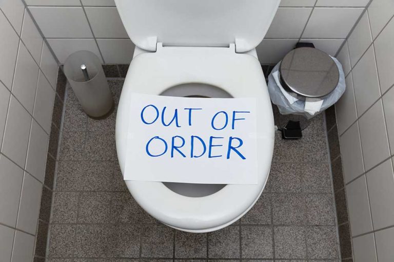 toilet with out of order sign